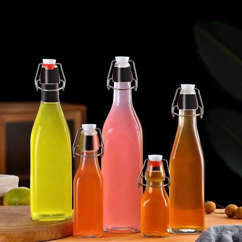 Factory Wholesale 500ml Beverage Bottles for Fruit Juice and Beer Glass Bottle with Crown Cap Packaging