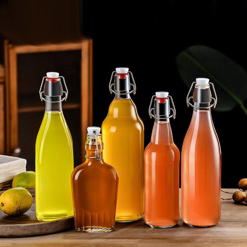 Factory Wholesale 500ml Beverage Bottles for Fruit Juice and Beer Glass Bottle with Crown Cap Packaging