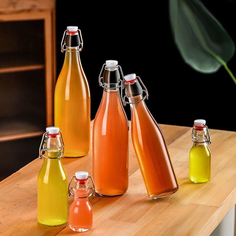 Factory Wholesale 500ml Beverage Bottles for Fruit Juice and Beer Glass Bottle with Crown Cap Packaging